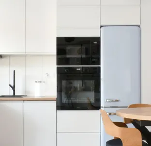 Flat with a blue sofa